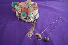 A vintage oriental cap with pom poms,bells, and metallic embroidery with mirrors, also included