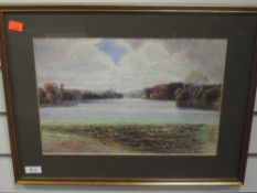 A watercolour, F Ogilby, lake landscape, indistinctly signed, and dated 1911, 25 x 37cm, plus