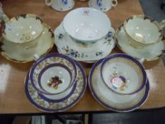 A selection of fine tea cups and saucers including Shelley hand decorated and Davenport