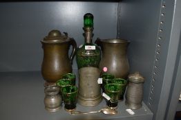 A green Venetian glass decanter and glasses having silver gilding and a selection of tankards and