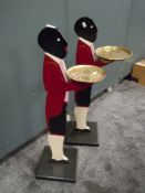 Two early 20th hand painted dumb waiters or side tables with brass trays