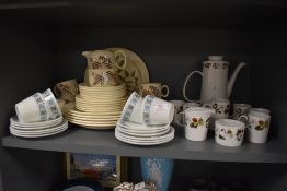 A large collection of mid century ceramics including cups and saucers, plates , coffee pot and more