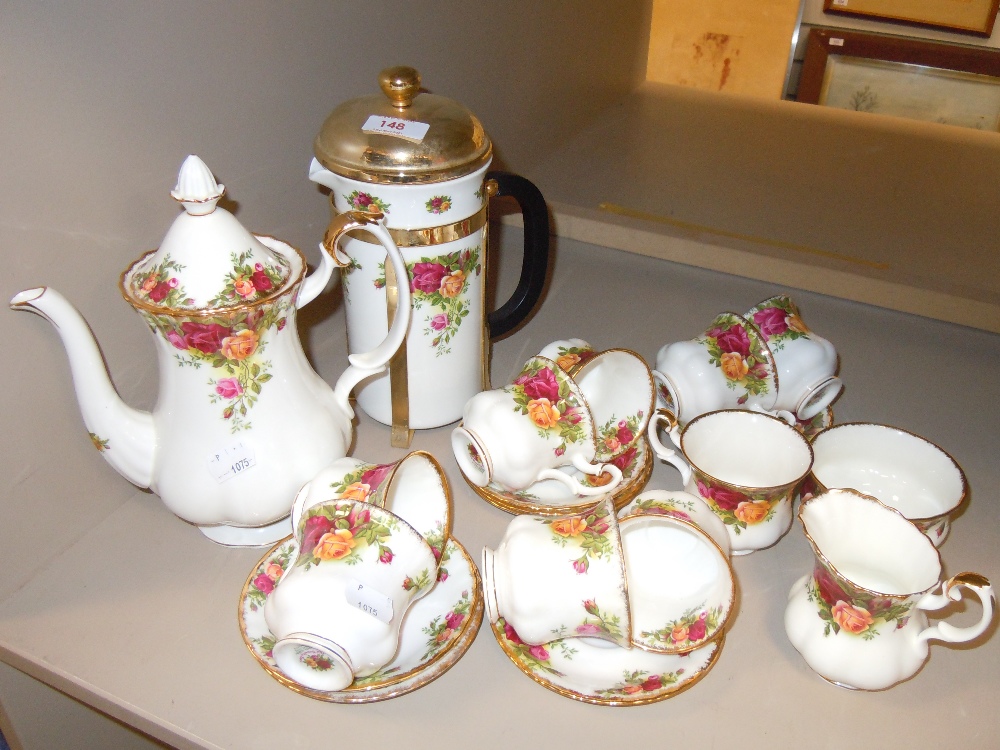 A selection of tea and coffee ceramics by Royal Albert in the old country roses design