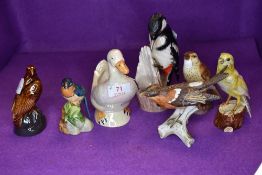 A selection of ceramic bird studies including Goebel Great Spotted Woodpecker, Canary Bird, Bird