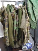 A selection of ex army or military jackets mostly jungle camouflage approx six jackets