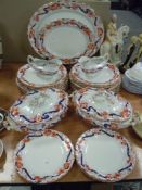 A selection of dinner and table wares having and Imari style palette