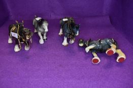 Four ceramic studies of Shire Horses, small sizes with harnesses to three of them