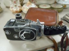 A vintage Bolex super eight film camera with case model B8