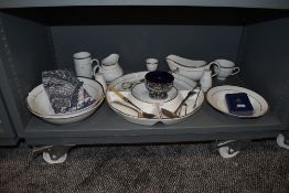 An assortment of table ware and flat ware.