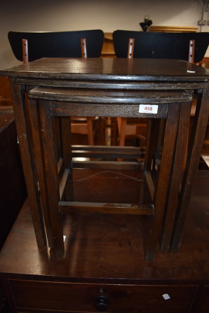 An early 20th Century nest of oak and ply occasional tables