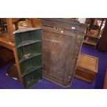 A 19th Century mahogany corner cupboard, in need of restoration , having painted green shelf