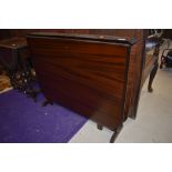 A vintage mahogany sutherland style dining table, width approx. 91cm