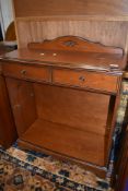 A Rossmore style hall shelf with frieze drawer