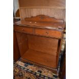 A Rossmore style hall shelf with frieze drawer