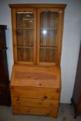 A vintage pine bureau bookcase , width approx. 89cm height 206cm