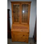 A vintage pine bureau bookcase , width approx. 89cm height 206cm