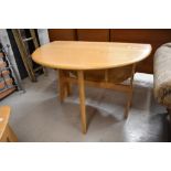 A modern Ercol light ash gateleg table, 1156