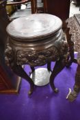 A Chinese hardwood carved plant stand, height approx. 76cm