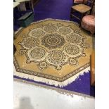 A vintage Octagonal rug, predominantly beige