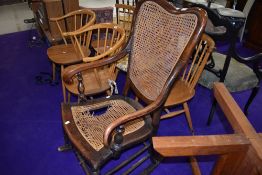 A 19th Century stained frame rocker having canework seat and back