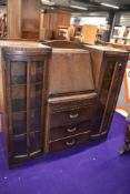 An early 20th Century oak 'sondheim' bureau display