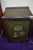 A vintage wrought iron safe, with brass plate for George Titterton, Birmingham, approx 39 x 56 x