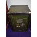 A vintage wrought iron safe, with brass plate for George Titterton, Birmingham, approx 39 x 56 x