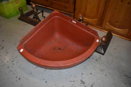 A vintage cast iron (later painted) corner trough or sink, Musgraves, Belfast