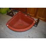 A vintage cast iron (later painted) corner trough or sink, Musgraves, Belfast