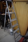 A set of aluminium step ladders