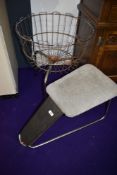 A vintage retail shop display basket and a shoe shop stool