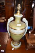 A reproduction urn style table lamp