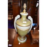 A reproduction urn style table lamp