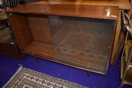 A vintage teak bookcase, labelled Avalon