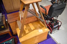 A 19th Century satinwood tool or bedding style trunk of small proportions , having brass handles,