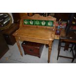 A 19th Century pine washstand having tile back