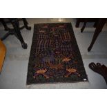 A Persian rug having vibrant animalistic style decoration, approx. 130 x 80cm