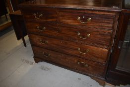 A 19th Century mahogany chest of two other three drawers having brass drop handles and bracket feet