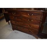 A 19th Century mahogany chest of two other three drawers having brass drop handles and bracket feet