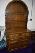 A reproduction oak Priory/Old charm style dutch dresser