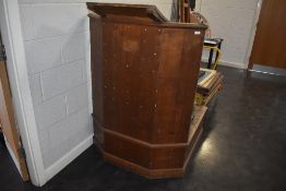 A traditional oak lecturn/rostrum/witness box, with platform