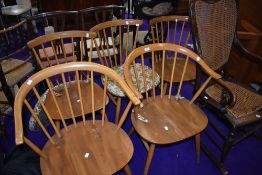 Five (three plus two) Ercol light stain beech spindle back kitchen chairs