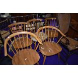 Five (three plus two) Ercol light stain beech spindle back kitchen chairs