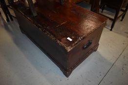 A traditional stained frame bedding box