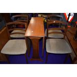 A vintage G plan or similar gateleg table and four rail back chairs, chairs labelled as G plan