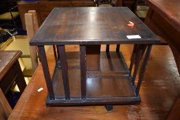 An early 20th Century mahogany table top revolving bookcase, width approx. 35cm, height 33cm