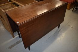 A 19th Century mahogany table having square tapered gatelegs, width approx 122cm, opens to 150cm