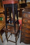 An early 20th Century oak occasional table and a vintage bar stool