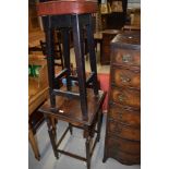 An early 20th Century oak occasional table and a vintage bar stool