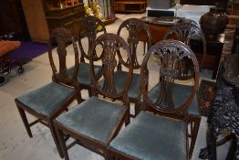 A set of six early 20th Century mahogany dining chairs, in the Hepplewhite style